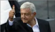  ?? THE ASSOCIATED PRESS ?? Presidenti­al candidate Andres Manuel Lopez Obrador, of the MORENA party, gestures during the general election in Mexico City on Sunday.