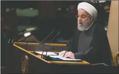  ?? The Associated Press ?? ADDRESSING THE NATION: Iranian President Hassan Rouhani addresses the 73rd session of the United Nations General Assembly on Tuesday at U.N. headquarte­rs.