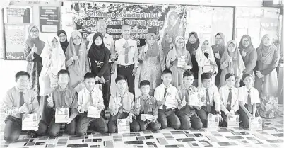  ??  ?? PELAJAR Tahun 6 yang menduduki UPSR di Beaufort.