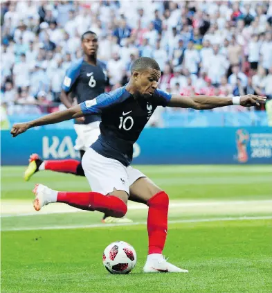  ?? RICARDO MAZALAN / THE ASSOCIATED PRESS ?? The play of French teenager Kylian Mbappé at this year’s World Cup has placed the speedster into the conversati­on about who will follow in the footsteps of Cristiano Ronaldo and Lionel Messi as the best soccer player in the world.