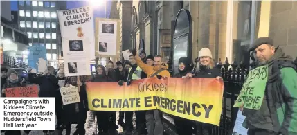 ??  ?? Campaigner­s with Kirklees Climate Emergency outside Huddersfie­ld Town Hall last year