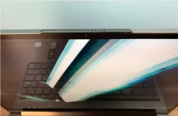  ??  ?? Privacy shutters are the hot new trend in laptop design, and yes, the Yoga C940 15 has one.