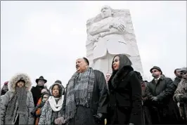  ?? WIN MCNAMEE/GETTY ?? Martin Luther King III speaks Monday at the Martin Luther King Jr. Memorial in Washington. “We got to find a way to work on this man’s heart,” he said of President Donald Trump.