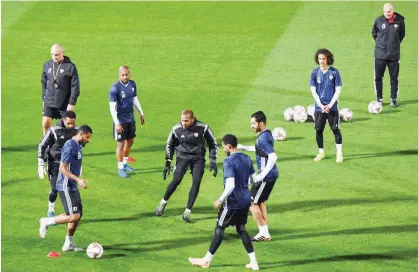  ??  ?? UAE players attend a training session on Sunday, ahead of their match against Thailand.