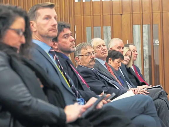  ?? Picture: Mhairi Edwards. ?? Waiting game: The audience listen intently during public discussion­s on the Tay Cities Deal.