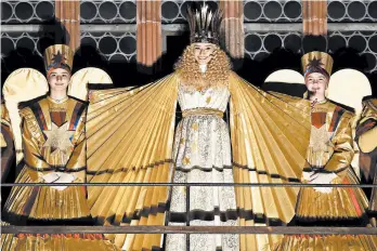  ?? MATTHIAS SCHRADER/AP ?? Benigna Munsi, dressed as the Christkind, or Christ Child, opens the Christmas market in Nuremberg, Germany.