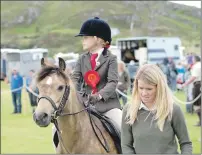  ?? Photograph: Abrightsid­e Photograph­y. ?? Above: Vhairi MacPhail, first in tack and turnout, with her mum Eilidh MacPhail.