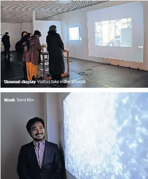  ?? ?? Unusual display
Work
Trent Kim
Visitors take in the artwork