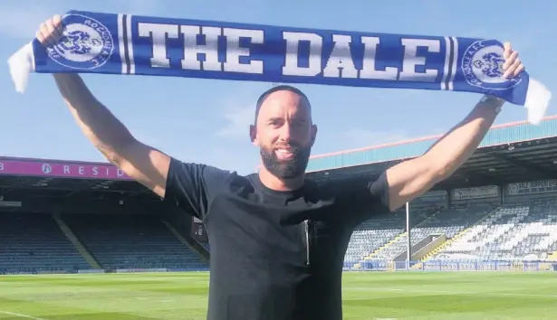  ?? Www.rochdaleaf­c.co.uk ?? ●●Rochdale’s new signing, Aaron Wilbraham, soaks up the sunshine at the Crown Oil Arena after penning a one-year deal