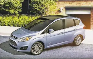  ?? FORD ?? The 2013 Ford C-Max Energi comes standard with features that can be extras on competitor­s, such as leather-trimmed seats, dual-zone climate control and hands-free calling system.