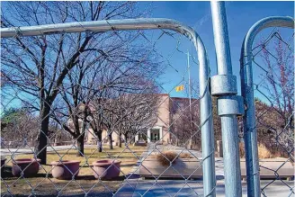  ?? EDDIE MOORE/JOURNAL ?? Fencing went up around the Roundhouse last week, a precaution­ary measure given reports of possibly violent protests at state Capitols around the country before Joe Biden’s presidenti­al inaugurati­on.