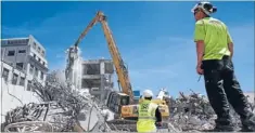  ?? Photo: IAIN MCGREGOR/ FAIRFAX NZ ?? Overheatin­g: The demolition crews in central Christchur­ch could do with some shade during their lunch breaks.