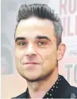  ??  ?? Robbie Williams