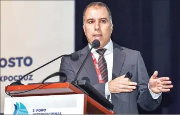  ?? AIZAR RALDES/AFP ?? Bruno Cesar Ladeira, Environmen­t and Health Security Manager of Petrobras Amazonas, speaks during the First Internatio­nal Forum on Gas, Petrochemi­cals and Green Fuels.