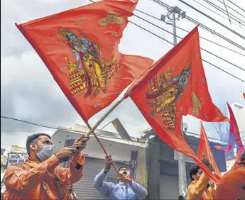  ?? AFP ?? BJP supporters celebrate in New Delhi on Wednesday.