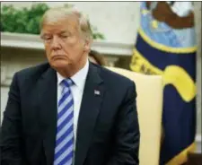  ?? EVAN VUCCI — THE ASSOCIATED PRESS ?? President Donald Trump listens to Emir of Kuwait Sheikh Sabah Al Ahmad Al Sabah during a meeting in the Oval Office of the White House, Wednesday in Washington.