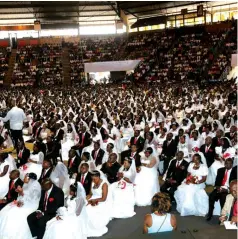  ??  ?? In November 2014, hosted the mass wedding of more than 600 couples at UFIC Harare’s City Sports Centre