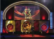  ?? PHOTO BY CHRIS PIZZELLO/INVISION/AP, FILE ?? Host Mario Lopez appears on stage at the 46th annual Daytime Emmy Awards in Pasadena, Calif., on May 5, 2019. The stars and creators of daytime television are gathering in person to hand out trophies live at the Daytime Emmys on Friday.