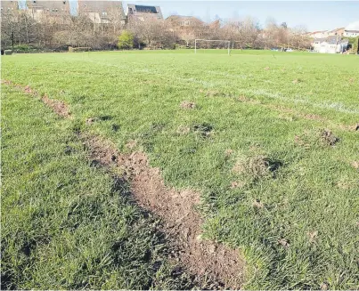  ?? Picture: Paul Reid. ?? The car tracks left the playing fields deeply rutted.