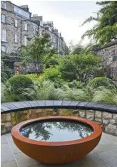  ??  ?? The Urbis bowl creates a calming focal point for this seating area. The bowl’s 1.2m diameter allows it to function perfectly as a pond, and could be used to grow dwarf waterlilie­s.