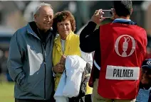  ??  ?? Arnold Palmer with his wife Kathleen Gawthrop at St Andrews, Scotland, in 2015.