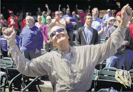  ?? MARK WEBER/THE COMMERCIAL APPEAL ?? Retired pastor Bill Hart dances to religious music during the free, hours-long Memphis Exalts Jesus event Saturday afternoon at AutoZone Park. Hundreds of people came together at the Downtown ballpark to pray, listen to music, hear Scripture reading...