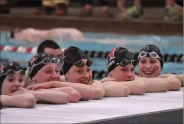  ?? ERIC BONZAR — THE NEWS HERALD ?? Hawken girls keep an eye on the action during the state meet in Canton Feb. 23.