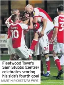  ?? MARTIN RICKETT/PA WIRE ?? Fleetwood Town’s Sam Stubbs (centre) celebrates scoring his side’s fourth goal