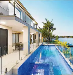  ?? ?? 17 Hedges Ave, Mermaid Beach which is being marketed by Amir Prestige and (right) 2 Calmwater Drive, Helensvale marketed by Ray White Broadbeach Waters.