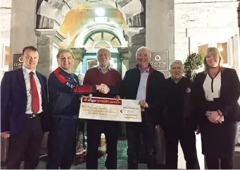  ??  ?? Padraig Rooney, winner of the Sligo Rovers club lotto, with Sligo Rovers manager, Liam Buckley, secretary Brendan Lacken, Lotto Administra­tor Frank Beirne, Lotto Seller Hugh Quinn and Aisling McSharry. Business Developmen­t Manager of the Clayton Hotel.