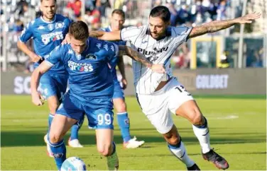  ?? Reuters ?? Empoli’s and Atalanta players in action during their Italian League match on Sunday.