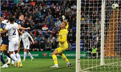  ?? ?? Chris Wood heads in Newcastle’s winner against Tranmere. Photograph: Richard Lee/Shuttersto­ck