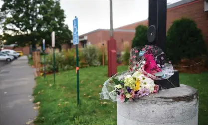  ?? Photograph: Craig Lassig/EPA ?? Flowers outside the Dar Al-Farooq Islamic Center in Bloomingto­n Dar Al Farooq Center Islamic Center, on 5 August 2017.