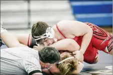  ?? NATE HECKENBERG­ER - FOR MEDIANEWS GROUP ?? Coatesvill­e’s Dylan McGuire pins West Chester Henderson’s Liam Keevil at 285 pounds.