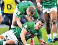  ??  ?? Picking himself up: Johnny Sexton is lifted to his feet during a physical clash in Dublin