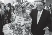  ?? Express-News file photo ?? Urban-15’s Catherine Cisnero and former ExpressNew­s reporter John W. Gonzalez at last year’s gala.