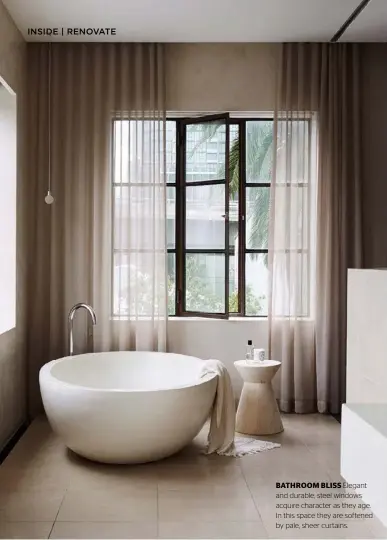  ??  ?? BATHROOM BLISS Elegant and durable, steel windows acquire character as they age. In this space they are softened by pale, sheer curtains.