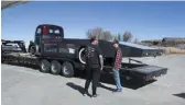  ??  ?? Before we jumped back on the road, Chris and Joe did a final inspection to make sure everything was copacetic. Cody Stoute from Popeye’s Rod Shop was ready to roll too with Chris Ortego’s badass COE in tow. With no issues, we were back at it!