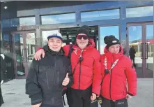  ?? PROVIDED TO CHINA DAILY ?? Yu Momo (left) greets foreign skiers at Koktokay Ski Resort during the winter snow season last year.