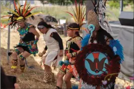  ?? PHOTOS BY GERARDO ZAVALA — DAILY DEMOCRAT ?? An Aztec dance group performs during the event Saturday in West Sacramento.