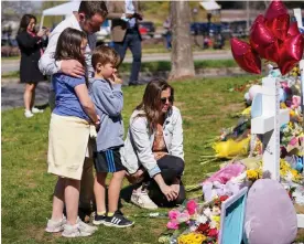  ?? Photograph: Mickey Bernal/Rex/Shuttersto­ck ?? A family mourns the six victims of the Covenant school shooting in Nashville, Tennessee, last month.