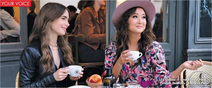  ?? PUBLICITY PHOTO ?? Lily Collins (l) and Ashley Park (r) star in Netflix’s “Emily in Paris”