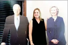  ?? LYNN KUTTER ENTERPRISE-LEADER ?? Andrea Jenkins, second-grade teacher at Williams Elementary School, stands with life-size cutouts of former President Bill Clinton and his wife, Hillary Clinton, also the Democratic nominee in the 2016 Presidenti­al election.