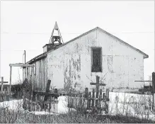  ??  ?? A condemned church in Fort Severn, Ontario's most northerly community. Here, there’s a deeply-ingrained suspicion of politics.