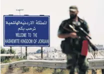  ?? PHOTO: REUTERS ?? In control . . . A Syrian soldier stands at the Nasib border crossing with Jordan in Deraa, Syria, on Saturday.