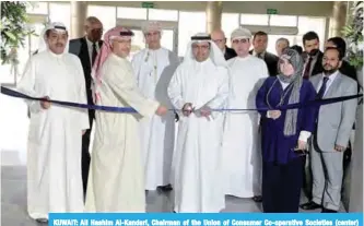  ??  ?? KUWAIT: Ali Hashim Al-Kandari, Chairman of the Union of Consumer Co-operative Societies (center) inaugurate­s the Kuwait Internatio­nal Agro Food Expo yesterday. —KUNA