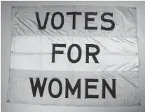  ?? COURTESY OF SOPHIE SIDES COWAN ?? A “Votes for Women” banner is part of the traveling exhibition at the Slover. Suffragist­s carried banners and flags at rallies and parades.