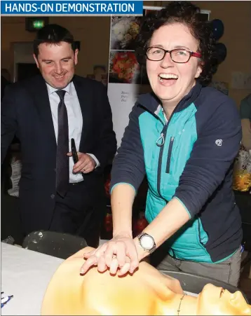  ??  ?? John Radford of Sherry Fitzgerald Radford and Jackie Hynes of the Rathangan Defib Team at the Bank of Ireland Enterprise Town event in Taghmon Camross Community Centre.