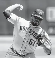  ?? Lachlan Cunningham / Getty Images ?? In only his second major league start, Astros pitcher Rogelio Armenteros gets roughed up by the Athletics on Saturday.