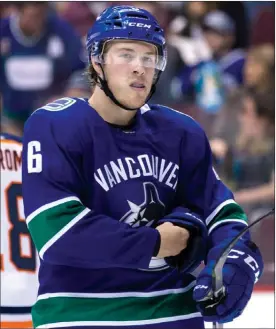  ?? The Canadian Press ?? Brock Boeser of the Vancouver Canucks looks on during Saturday’s preseason game against the Edmonton Oilers in Vancouver.